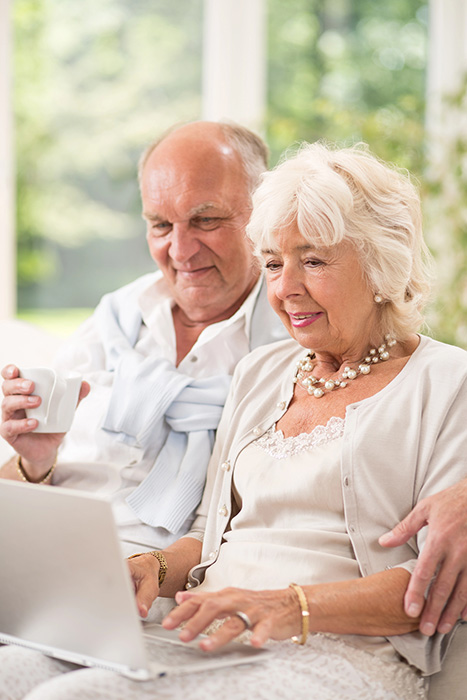 Couple watching on a laptop